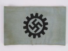 A WWII German Teno arm band, in frame.