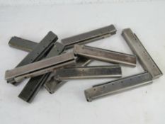 Ten 30rd Thompson magazines.