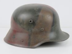 A reproduction German M17 helmet with li