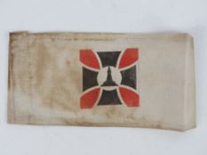 A WWI German Veteran armband, in frame.