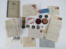 A quantity of Royal Navy ephemera including; first aid book dated 1943, tooth soap, shaving brush,