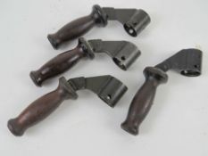 Four Bren gun handles.