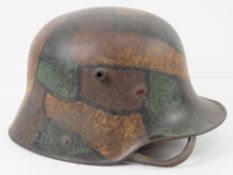 A WWI German M1916 snipers camouflage helmet having E.T.