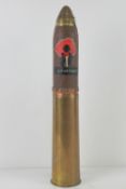 A WWI Canadian HE explosive 18pr dated 1916, the head bearing 'Lest we Forget' poppy trench art.