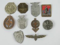 A quantity of assorted WWII German day badges including; N.S.D.A.