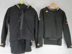 A quantity of US Navy uniform including tunic, sailors top with neck tie, shirt and trousers.