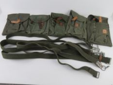 A quantity of five AK pounches together with five AK slings.