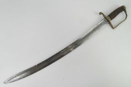 An early 1800s Police Constabulary cutlass, having brass hilt and guard, wooden grip,