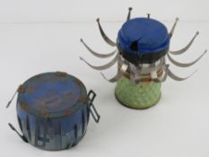 A French F1 Scatterable practice mine together with a British HB 876 training mine.