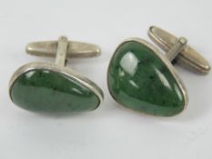A pair of silver and moss agate cufflinks, each approx 2.1 x 1.6cm, each stamped silver.