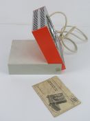 A vintage Combined Ultra Violet Infrared Health Lamp with original booklet.