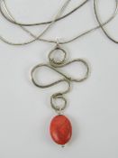 A handmade white metal and red hardstone pendant on 925 silver chain, pendant 4.8cm in length.