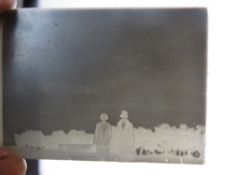 A quantity of sixteen silver nitrate glass photograph negatives, in cardboard box.