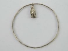A delightful HM silver teddy bear charm on bangle, hallmarked to bears back for Birmingham,
