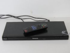 A Panasonic Blu-Ray player with remote.