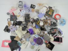A quantity of assorted fashion jewellery, some in original packaging.