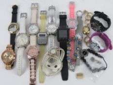 A quantity of assorted contemporary watches inc various ladies bracelet style watches.