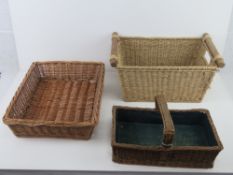 Two wicker baskets, one with handle 36 x 22 x 16cm, the other 45 x 34 x 11cm.
