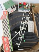 A quantity of Scaletric track and trackside ephemera.