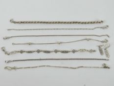 A silver Charles Rennie Mackintosh inspired bracelet and earring set,