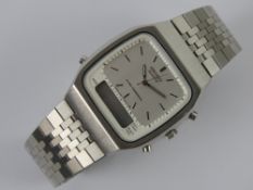A Seiko alarm chronograph H461-500A, stainless steel strap, silvered dial with digital dial below.