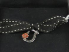 A Links of London HM silver charm in the form of a horseshoe, with box.