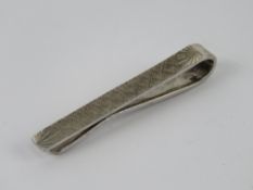 A HM silver tie slide / tie clip, 4.7cm in length, hallmarked for Birmingham.