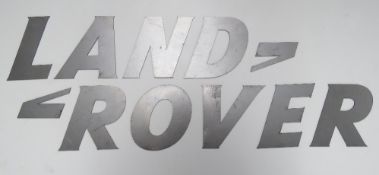 A rare solid metal font-correct 'Land Ro