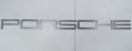 A rare solid metal font-correct 'Porsche