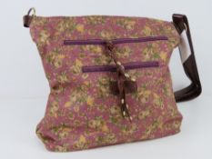 A 'as new' fabric tote bag having floral