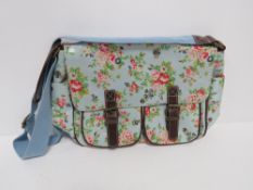 A Cath Kidson style floral patterned sat
