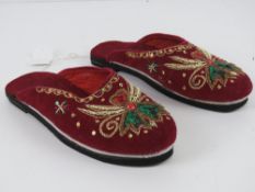 A pair of red velvet embroidered slipper