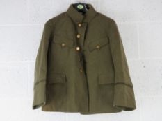 WWII Japanese Army Jacket having label and buttons, bearing Japanese writing within.