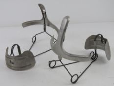 Two gas mask mounting frames.