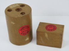 A WWII German S-mine and blast mine training aids, both dated 1939.