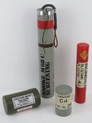Four inert high explosive training charges.