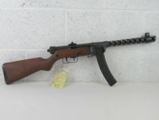 A deactivated Yugo M49 sub machine gun, having moving metal replica bolt (under spring pressure),