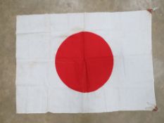 A WWII Japanese Red Rising Sun flag measuring 94 x 69cm.