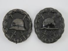Two WWI German black wound badges.