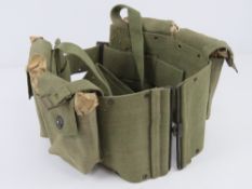 A US BAR canvas pouch containing four unissued magazines.