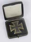 A WWII German first class Iron Cross in presentation box, pin stamped '20'.