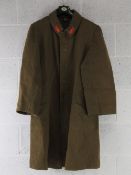 A WWII Japanese Army Private's 1st Class Great Coat having all buttons.