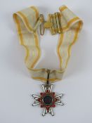 A Japanese Order of the Sacred Treasure medal with ribbon, in box.