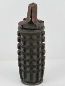 An inert WWI Austro Hungarian Zeitzunder grenade with fuse protector.