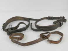 A pair of WWII padded Lafette straps, together with a WWII PPSH-41 leather sling.