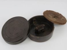 An inert WWII German bakelite mine.