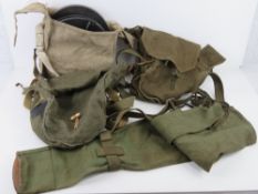 A quantity of DP28 magazines in bag together with additional bags and gun case.