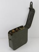 A WWII Russian Maxim tin having P&E tins within, one used for oil and the other for fuel.
