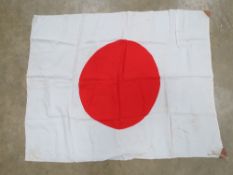 A WWII Japanese Red Rising Sun flag measuring 92 x 72cm.