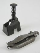 Two WWII Sten magazine loaders.